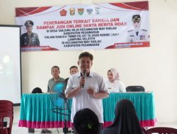 Diskominfotiksan Pesawaran Gelar sosialisasi bahaya Judi Online dan Penyebaran Hoaks di Balai Desa Tanjung Rejo, Kecamatan Way Khilau